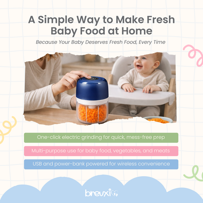 Person using a blue baby food maker on a table while a baby smiles in a high chair nearby.