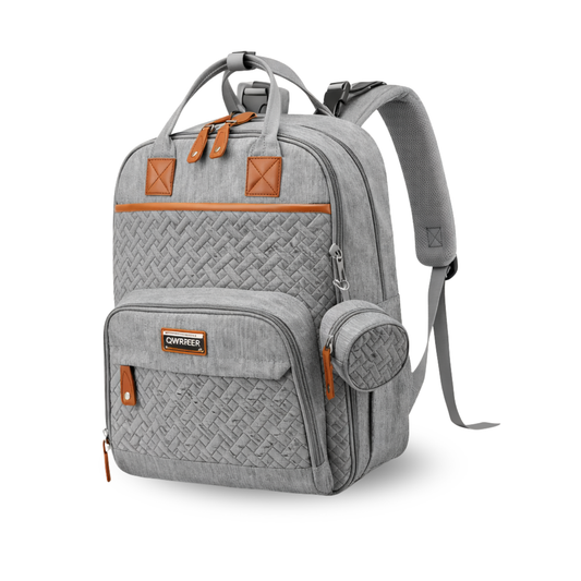 Grey diaper backpack with woven front design, brown leather details, and attached round pouch.
